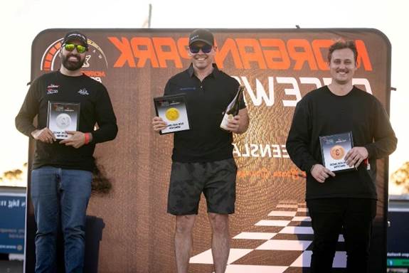 May be an image of 3 people and text